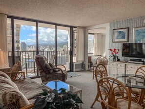 Living room  with Queen sofa sleeper, Flat Screen TV Just off the kitchen, with Mountain view to the Right and Ocean to the Left