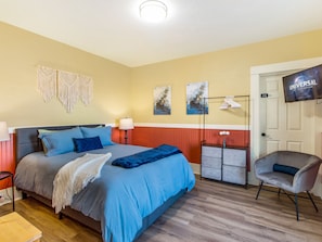 Cozy up in the queen bed for a movie.
Dresser and hangers are provided as well.

Unit #3 connects to both Unit #1 and Unit #2 for larger group rentals.  

Adult only unit