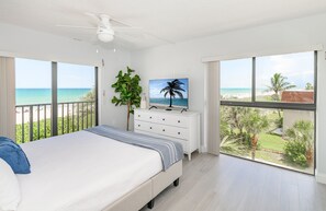 Serene bedroom retreat with a king-sized bed and breathtaking beachfront views.