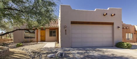 Laura Lane is a newly listed 3 Bedroom, 2 Bathroom Santa Fe Style home