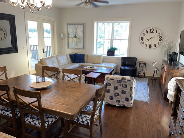 Living area opens to balcony overlooking Lakeside community 
