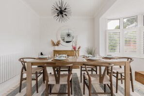 The dining table can seat up to six people.