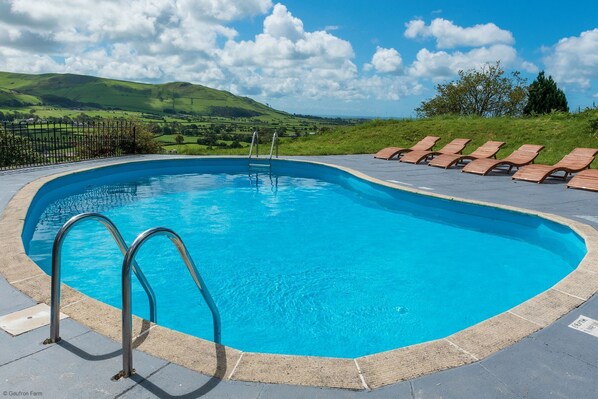 Heated Outdoor Pool, exclusive to guests at Old Farmhouse & Little Cottage. Open between May & September.