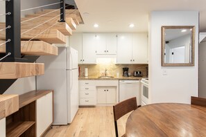 Dining area looking into kitchen