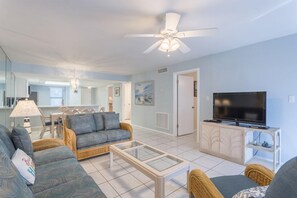 Our living area is bright with light and open to the dining and kitchen areas.