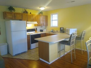 Stocked kitchen with full size appliances