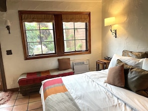 Bed view towards walkway and plunge pool