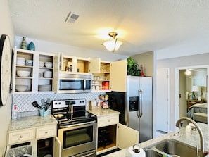 Cook up a meal in this fully equipped kitchen