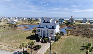 Your beautiful beach home with large circular driveway to park your cars. 