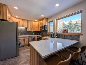 Well appointed kitchen for cooking with new appliances.