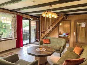 Furniture, Property, Building, Table, Couch, Wood, Plant, Lighting, Interior Design, Living Room