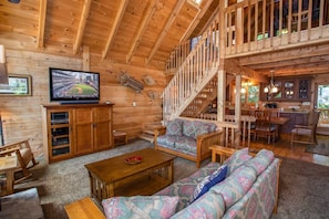 Living Room with HDTV Looking to the Loft