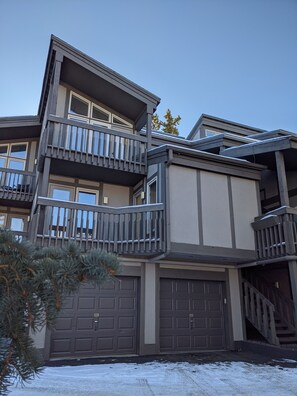 Front of building w/ private garage