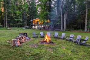 Light up a bonfire, sit and relax in Trex Adirondack chairs 