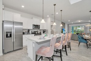 Polished Kitchen of the Apartment in Davenport Florida - Fully Equipped - Ample storage space for organized and clutter-free counters - Smart use of space with versatile storage solutions - Thoughtful placement of kitchen essentials for easy access