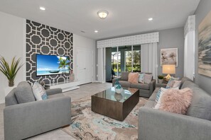 Alluring Living Area of the Apartment in Davenport Florida - Smart use of space with multifunctional furniture for a beautiful environment - Open-concept living area seamlessly connected to a stylish dining space - Smart TV and Netflix - Comfy Sofa