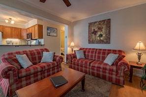 LIVING ROOM WITH VIEW TO KITCHEN