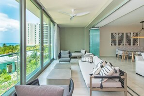 Sunroom with views of Seven Mile Beach and ocean