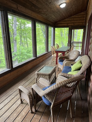 Beautiful expansive three season porch…perfect for morning coffee or dinners 