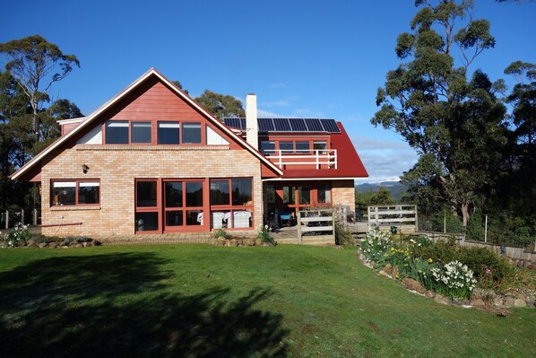 Black Bluff View Retreat. Black Bluff to south. Wrap around deck with BBQ.