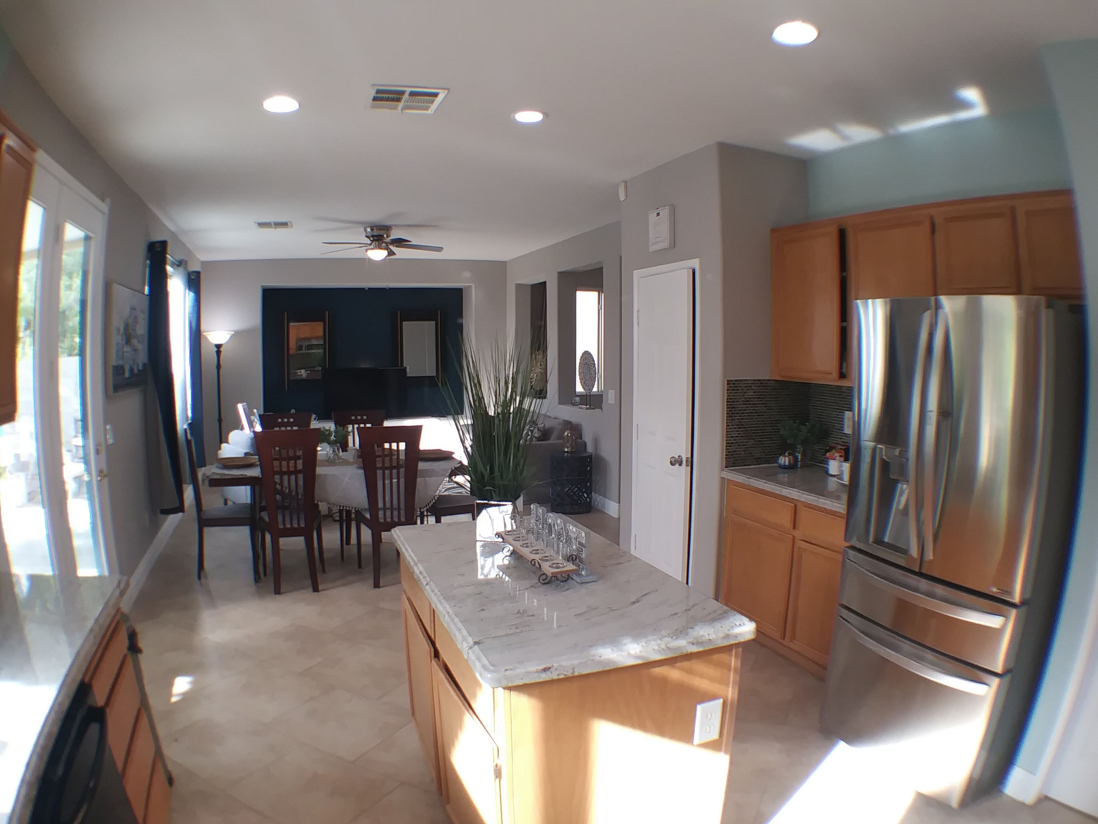 Overview of kitchen, dining and family room in the background. 