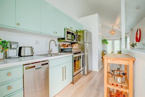 Experience the joy of meal preparation with the aid of updated stainless steel appliances, enhancing your culinary endeavors.