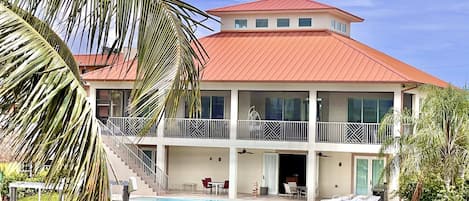 Beautiful spacious house screened upstairs lanai canal dock pool and bay view