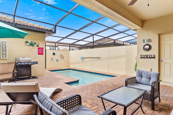 Pool deck with seating and dinning area