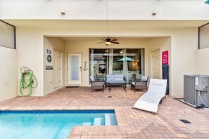 Poolside Paradise: The pool deck, adorned with comfortable seating and a dining area, invites you to indulge in leisurely moments of relaxation and al fresco dining, creating cherished memories under the sun-drenched sky.
