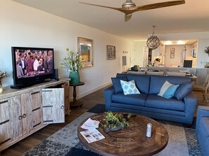 Living Room with large Smart TV with cable hook up