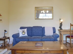 Comfortable seating within living area | Hill View House - Hillview Holidays, Aberfeldy