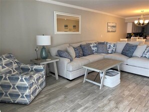 Brand new sectional in living room with ocean and beach views.