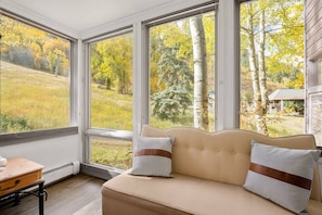 The master bedroom has a perfect view of the Shadow Mountain Lift and the Schuss Gully ski trail on Aspen Mountain.