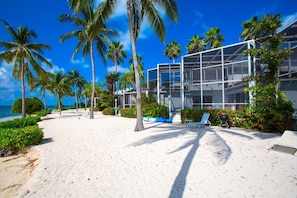 White sandy beachfront steps off the back door. 