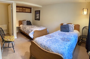 In addition to 2 twin beds, there is an extra large closet with a roll-away bed.