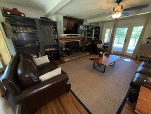 Great Room with Lake View, Leather Seating, 65" Flat Screen and Fireplace