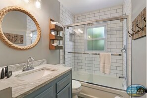 Main floor full bath with tub