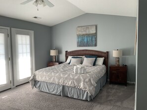 Master suite with king bed, private bath and a balcony. 