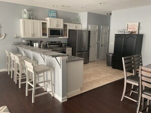 Large kitchen with plenty of seating. 