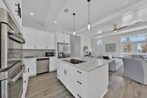 Well Equipped Kitchen with Island Cooktop