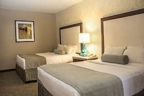 Beds come with convenient bedside lighting