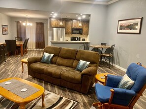 The living room has plenty of seating for your group!