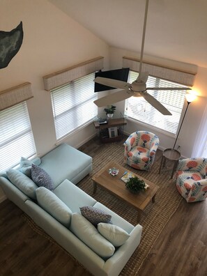 View of the living area from the second floor loft