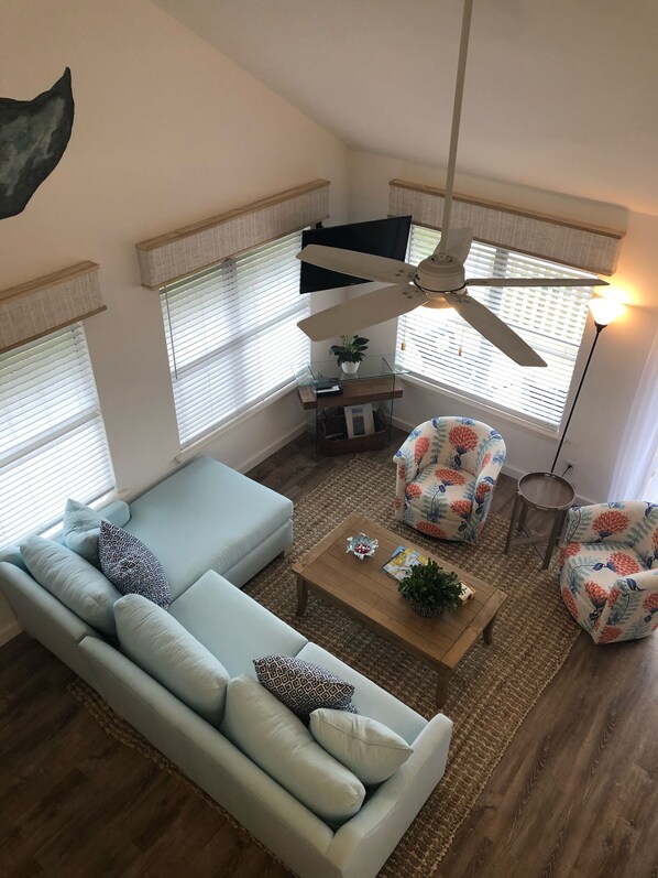 View of the living area from the second floor loft