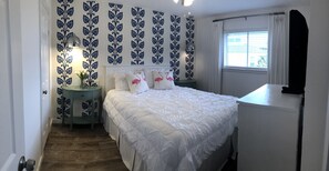 Bedroom #2 has a queen size bed. There is a TV in this bedroom.