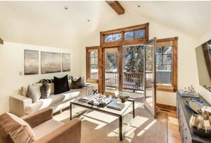 One of three out-door decks. Grill and seating, views of Aspen Mountain. 