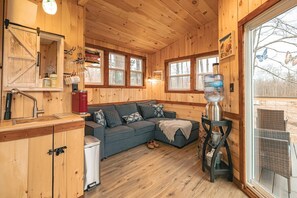 Here is the main living room. The sofa bed is perfect and sleeps two. As always water, coffee (regular and decaf), and tea are supplied. 