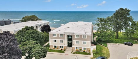 Aerial of building and lake