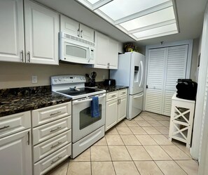 Another view of the full kitchen inside the condo - Another view of the full kitchen inside the condo