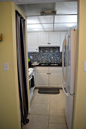 Tile floor and nice back splash make clean up quick and easy.